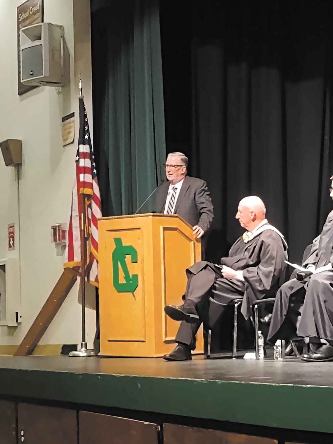 GREETINGS FROM 
THE MAYOR: (right) 
Mayor Kenneth Hopkins had a unique message for the graduates of 
Cranston East, having spent 27 years as a 
Thunderbolt. He reflected on those years